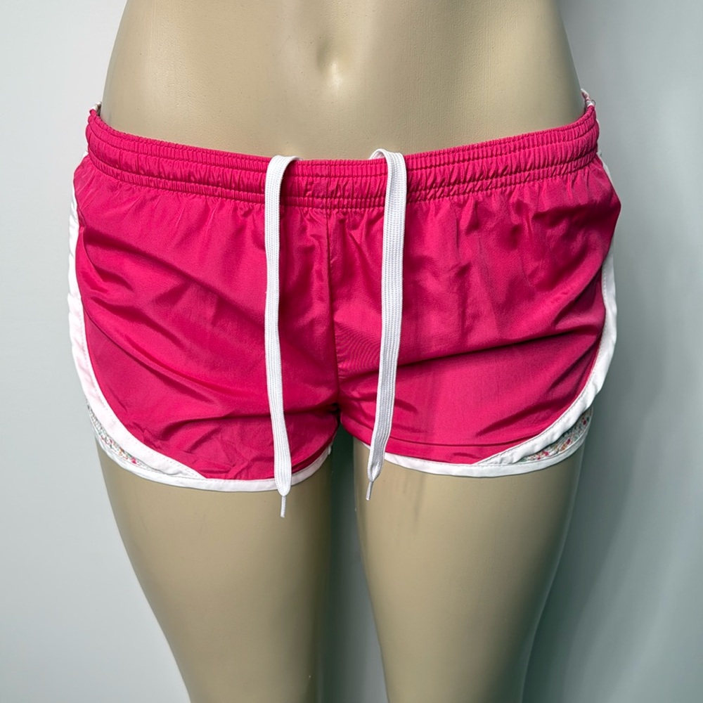 So pink shorts with ditsy floral design on the side size small